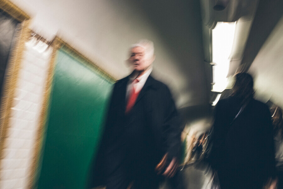 Blurry picture of an old man walking