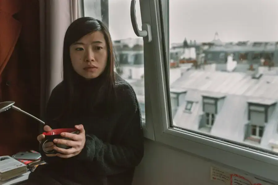 Woman sitting on a coach