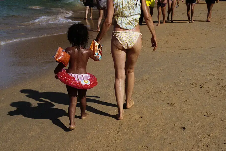 Woman and kid at the beach